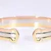 Cartier Double C 18k Tri-Gold Cuff Bracelet